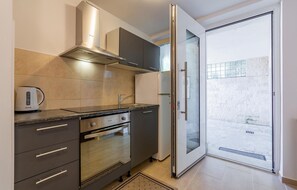 Fridge, microwave, stovetop, coffee/tea maker