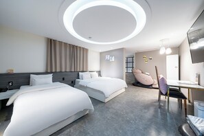 A modern hotel room with two beds, a desk, a chair, a massage chair, and a TV.