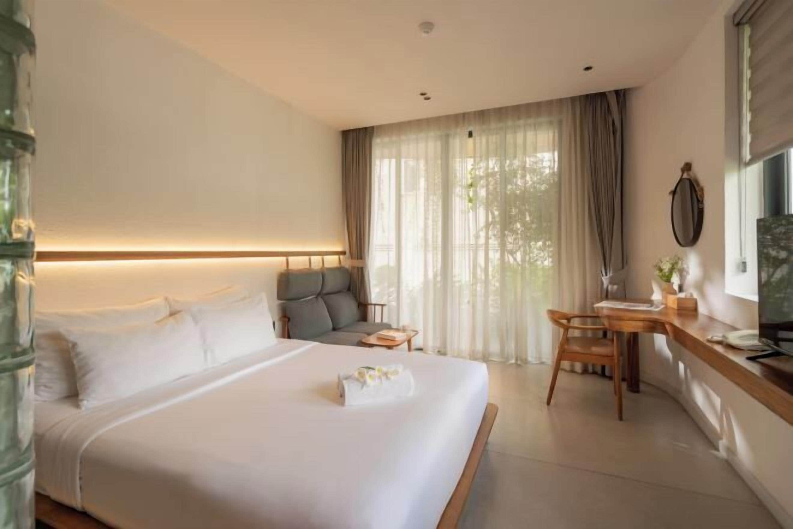 Premium bedding, down comforters, pillowtop beds, minibar