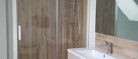 Shower, towels, soap, toilet paper