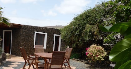 Volcanic lava stone house short walk to the beach, sea and mountain views