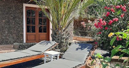 Volcanic lava stone house short walk to the beach, sea and mountain views