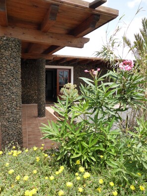Exterior detail - Volcanic lava stone house short walk to the beach,  sea and mountain views (Arrieta, Lanzarote)