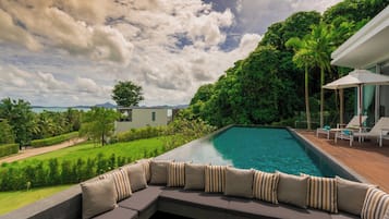 Outdoor pool, pool umbrellas, sun loungers