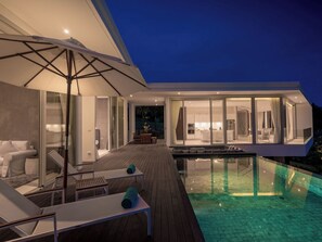 Outdoor pool, pool umbrellas, pool loungers