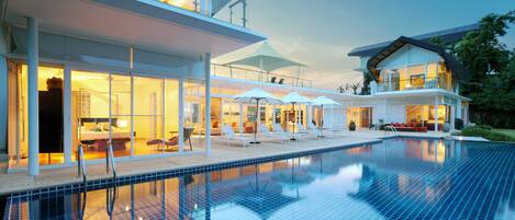 Outdoor pool, pool umbrellas, pool loungers