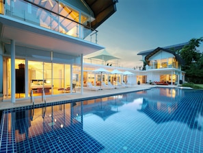 Outdoor pool, pool umbrellas, sun loungers