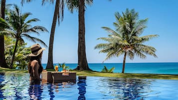 Outdoor pool, pool umbrellas, pool loungers