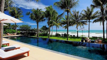 Outdoor pool, pool umbrellas, pool loungers