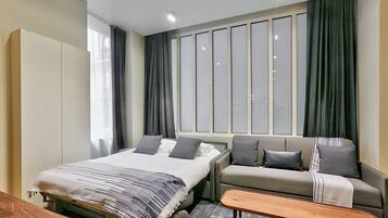 1 slaapkamer, een strijkplank/strijkijzer, gratis wifi, beddengoed
