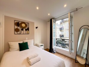 1 dormitorio, tabla de planchar con plancha, wifi gratis y ropa de cama