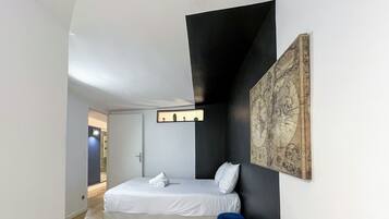 2 slaapkamers, een strijkplank/strijkijzer, gratis wifi, beddengoed