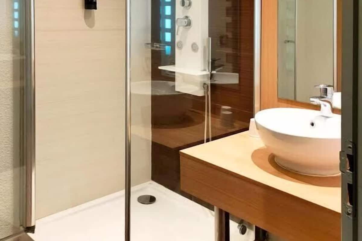 shower, towels, soap, toilet paper