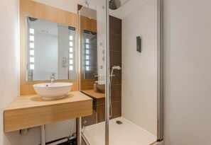 Shower, towels, soap, toilet paper