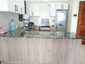 Fridge, microwave, oven, toaster