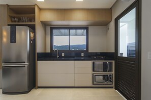 Departamento tradicional | Cocina privada | Refrigerador, microondas, horno y licuadora 