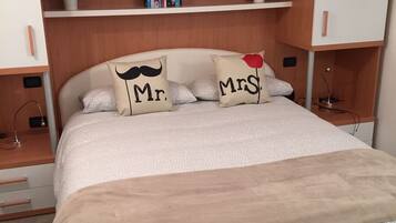 1 bedroom, desk, iron/ironing board, travel cot