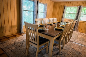 Enjoy meals with friends and family in this dining area, surrounded by comfortable seating for six.