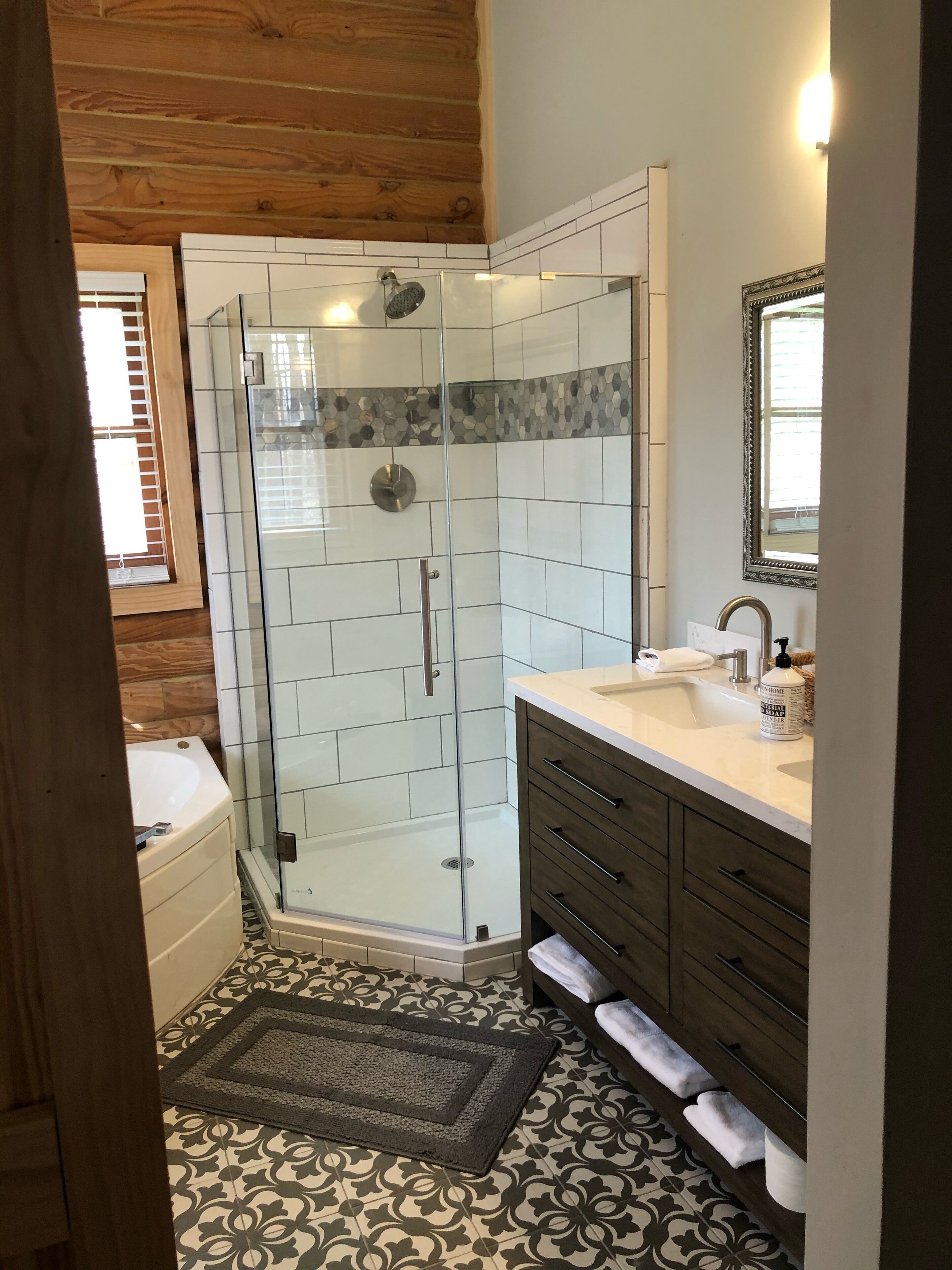 Combined shower/tub, hair dryer, towels, toilet paper