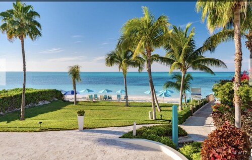 White House beachfront villa at Coral Gardens snorkeling reef