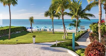 White House beachfront villa at Coral Gardens snorkeling reef