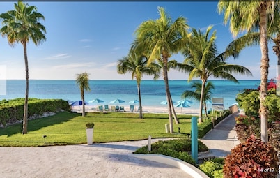 White House beachfront villa at Coral Gardens snorkeling reef
