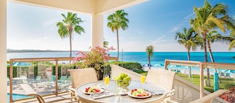 White House beachfront villa at Coral Gardens snorkeling reef