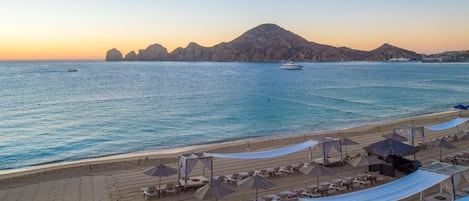 On the beach, sun-loungers, beach towels