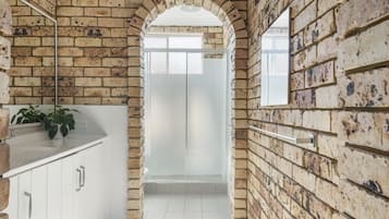 Bathtub, hair dryer, towels, soap