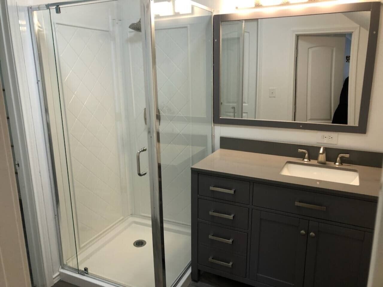 Combined shower/tub, hair dryer