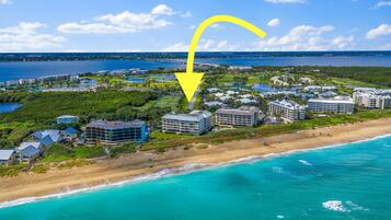 On the beach, sun-loungers, beach towels