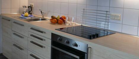 Fridge, oven, dishwasher, highchair