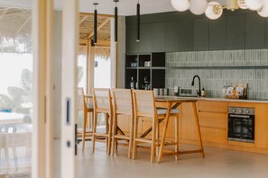 Royal Villa, 3 Bedrooms, Beachfront | Private kitchenette | Mini-fridge, coffee/tea maker, electric kettle, paper towels - Amber Lombok Beach Resort (Selong Belanak)