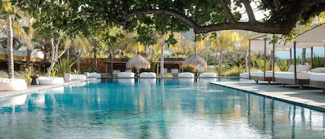 Outdoor pool, open 9:00 AM to 10:00 PM, pool umbrellas, pool loungers