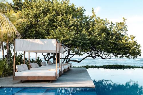 Outdoor pool, open 9:00 AM to 10:00 PM, pool umbrellas, pool loungers