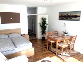 Studio, Multiple Beds, Balcony (incl. EUR 25 cleaning fee per stay) | Living area | 32-inch flat-screen TV with cable channels, TV