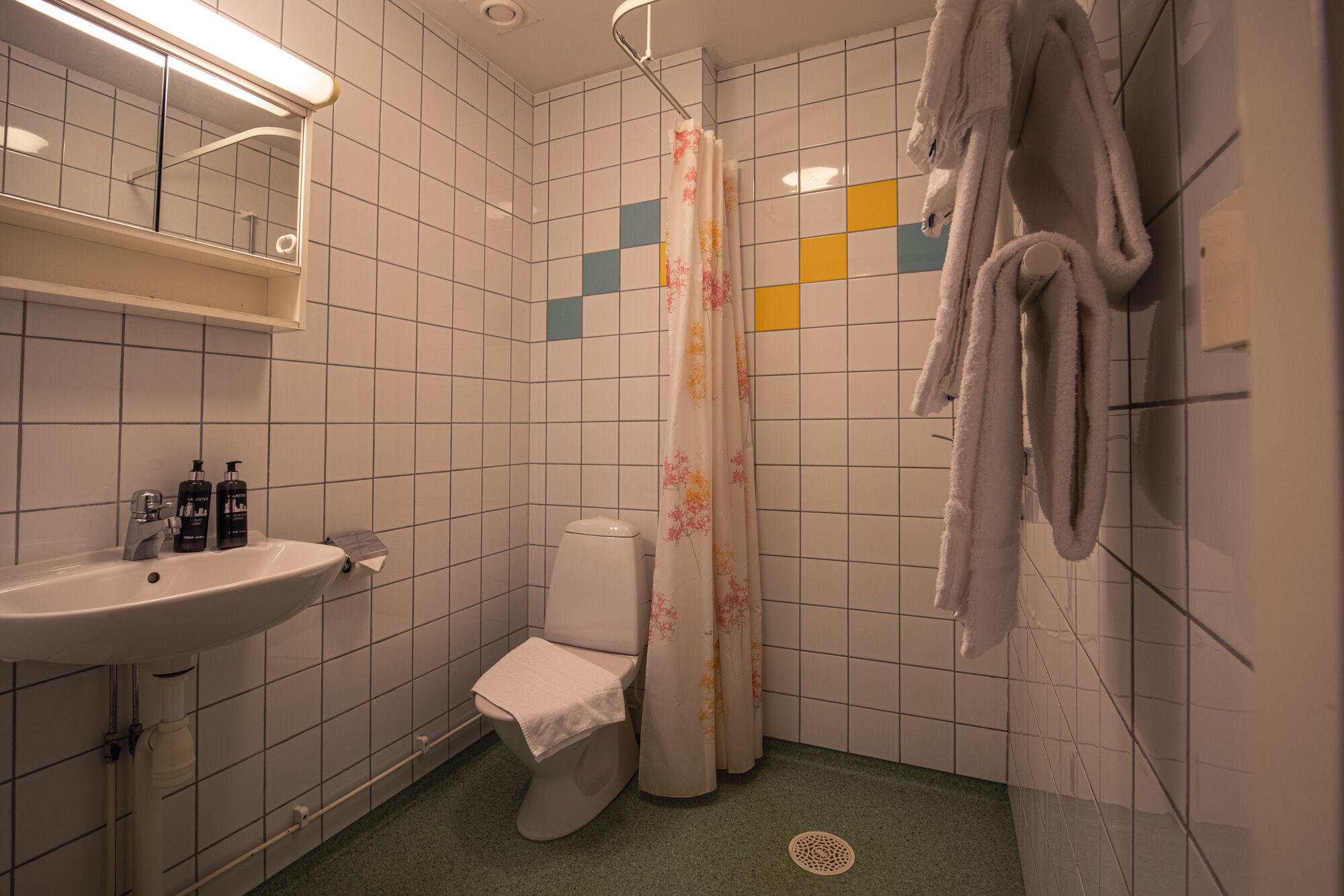 shower, towels, soap, toilet paper