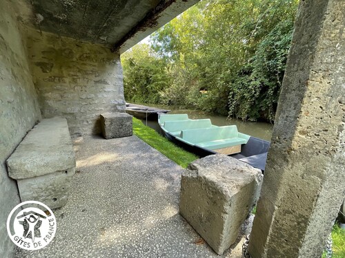 Charming Riverside House with Canoes, Garden, and Nearby Market in Marais Poitevin