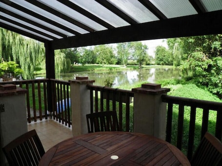 Outdoor dining. Charming Watermill Gîte: 6BR, Fireplace, Private Garden, Pond, Terrace, WiFi, Linens Included