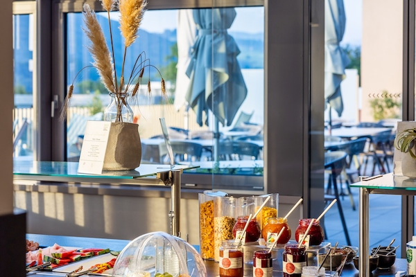 Daily buffet breakfast (EUR 18 per person)