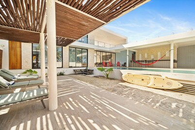 Exclusive Beachfront Escape | Modern Design, Pool & Fast WiFi