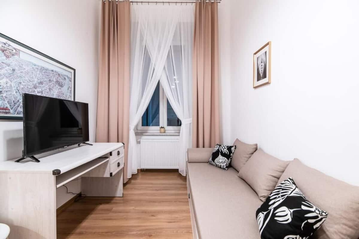 Comfort Apartment | Living area | Flat-screen TV