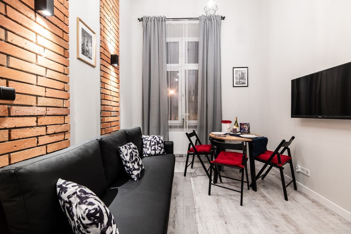 Classic Apartment | Living area | Flat-screen TV