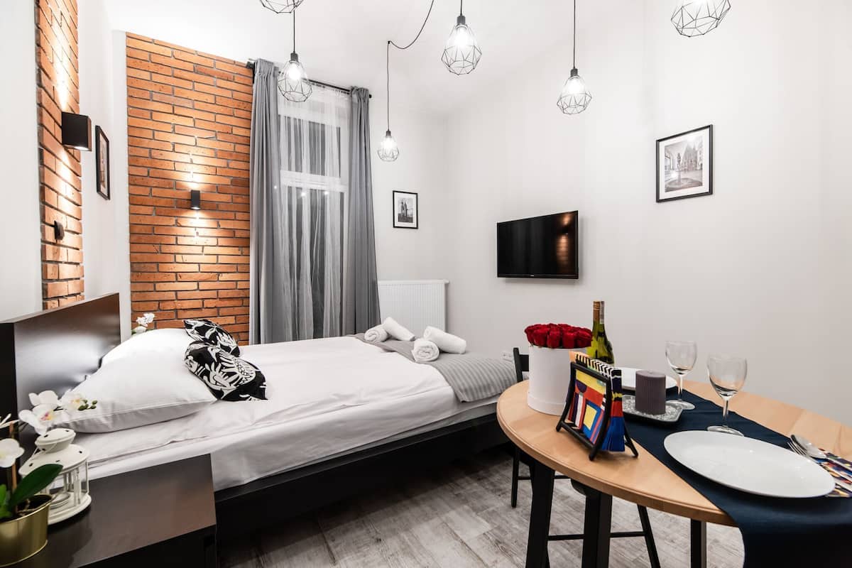 Superior Apartment | Living area | Flat-screen TV