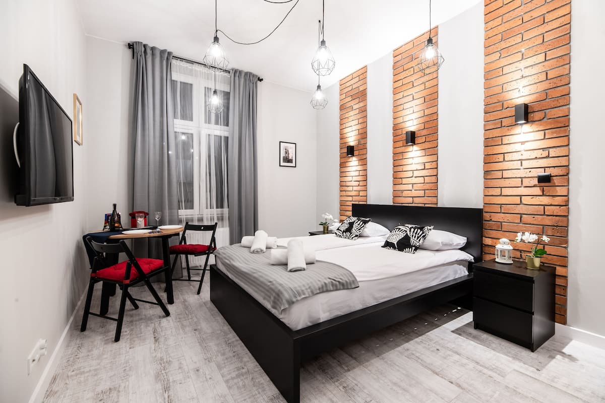 Superior Apartment | Living area | Flat-screen TV