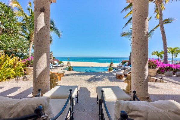 A heated pool, sun loungers