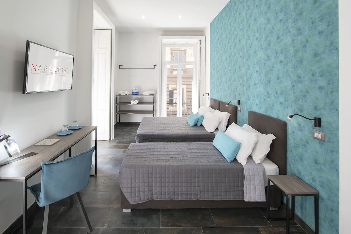 Comfort Triple Room | Down comforters, minibar, desk, laptop workspace