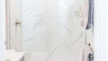 Hair dryer, towels, soap, shampoo