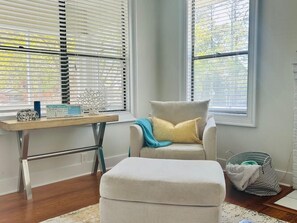 Smart TV, fireplace, table football, books