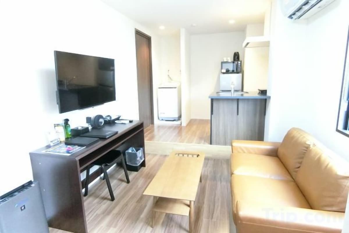 Flat-screen TV, pay movies